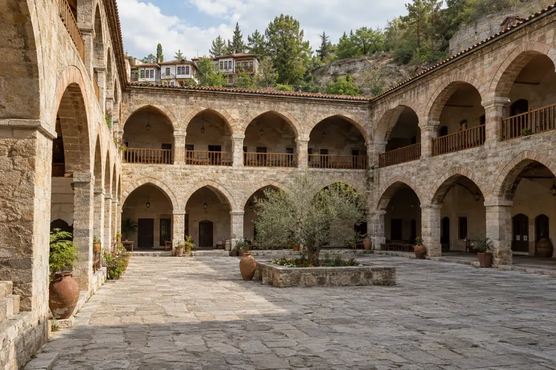 The arcaded stone courtyard of the Cinci Han caravanserai in Safranbolu