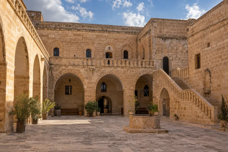 The arcaded stone courtyard of Deyrulzafaran Monastery near Mardin