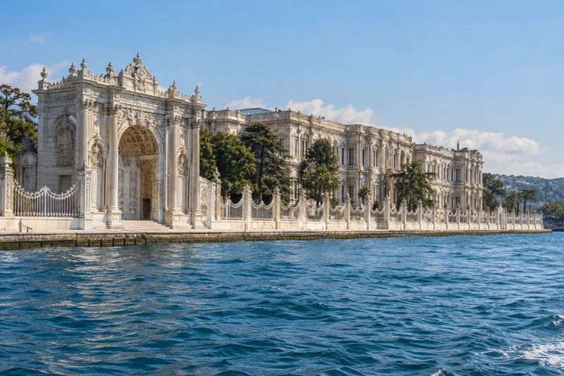 The white marble waterfront gate of Dolmabahce Palace seen from the Bosphorus