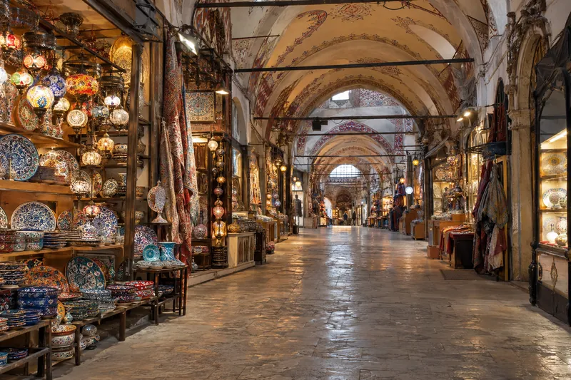 Painted arches, lanterns and ceramics shops in the Grand Bazaar, Istanbul