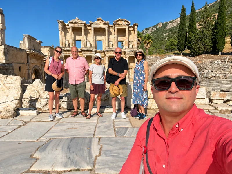 Turkey Itineraries guests. With our guide at the Library of Celsus, Ephesus