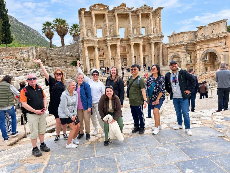 Turkey Itineraries guests. On the marble street below the Library of Celsus, Ephesus