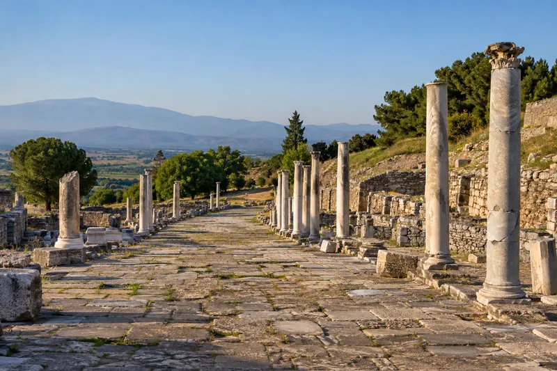 The colonnaded Sacred Way of the Asclepion of Pergamon, the ancient healing sanctuary, in warm evening light