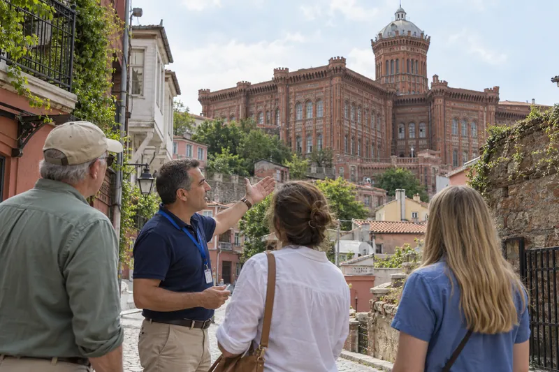 A private guide pointing out the red-brick Phanar Greek Orthodox College in Fener, Istanbul