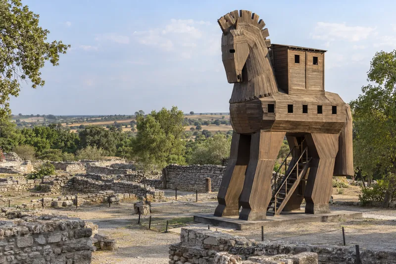 The wooden horse replica beside the ancient ruins of Troy