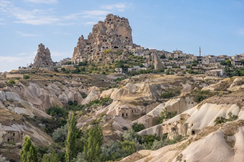 Uchisar Castle above Pigeon Valley and its carved dovecotes, Cappadocia