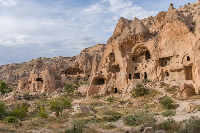 Abandoned cave dwellings carved into the rock in the Zelve valley, Cappadocia